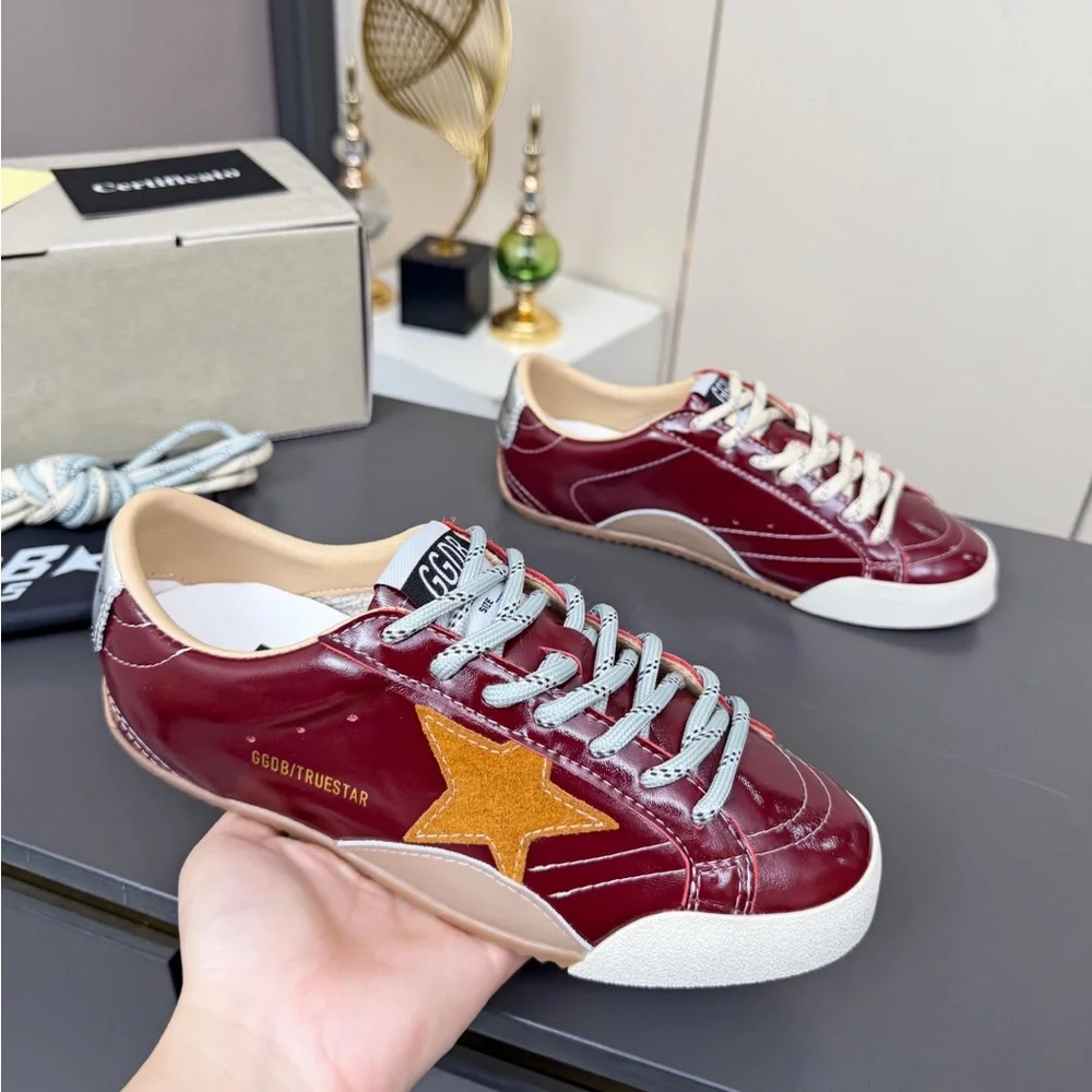 Golden Goose Women's Burgundy Leather Low-Top Sneakers with White Soles